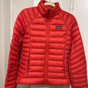 Patagonia women’s down sweater. Size small. Red/orange color